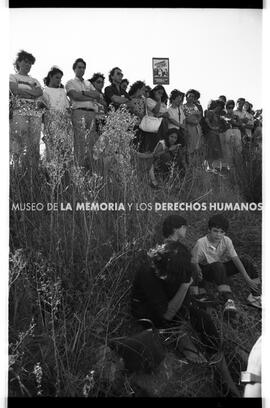 Widow and sons at spot where he was killed, Santiago 88